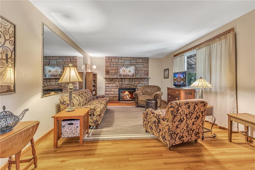250 Neville Road Beaver, PA 15009 - Photo 8 of 25 Spacious living room with wood burning fireplace.