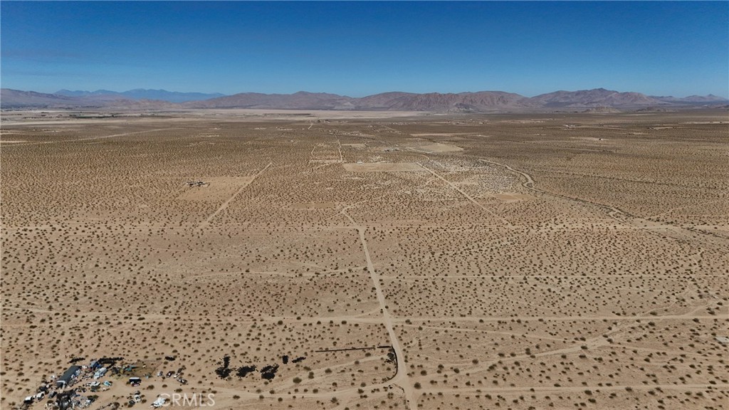 763 Esaw (near) Road Lucerne Valley, CA 92356 - Photo 4 of 11 a view of an ocean and a mountain