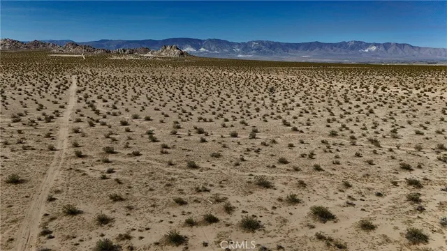 a view of an ocean and mountain