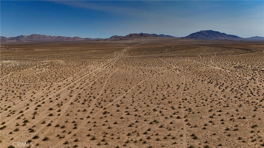 763 Esaw (near) Road Lucerne Valley, CA 92356 - Photo 10 of 11 a view of a house with a mountain