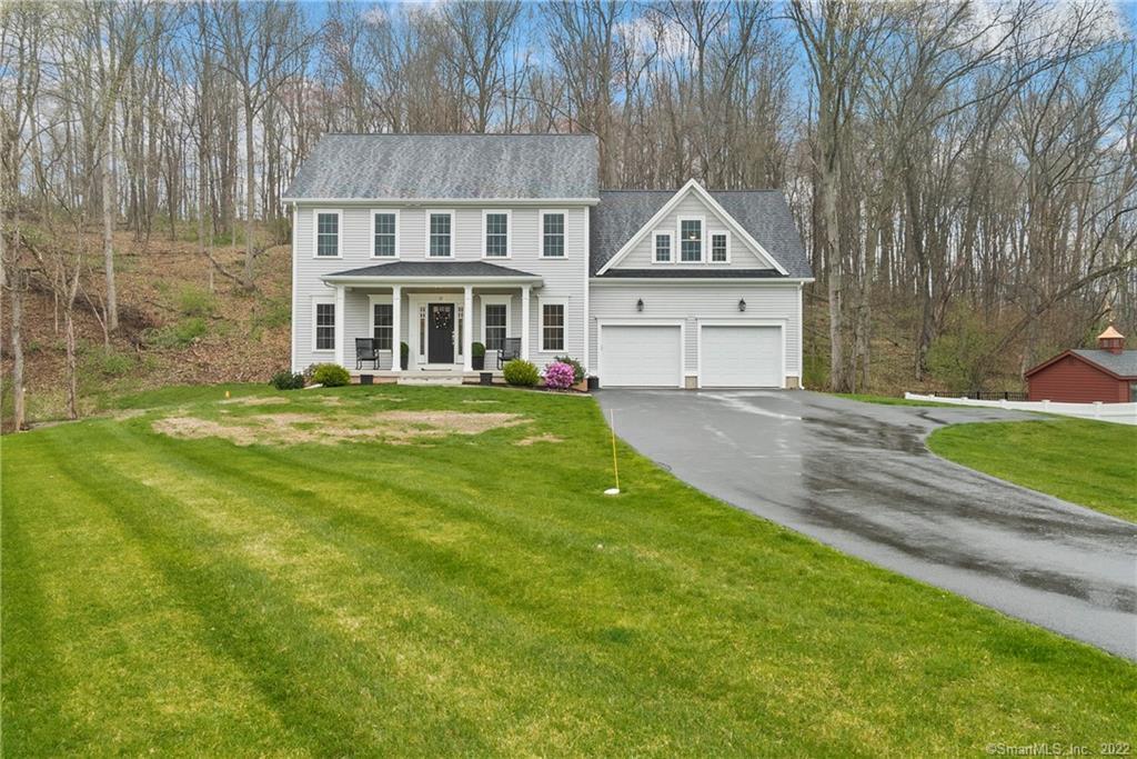 27 Redstone Road Suffield, CT 06078 - Photo 1 of 1 a view of house with yard in front of it