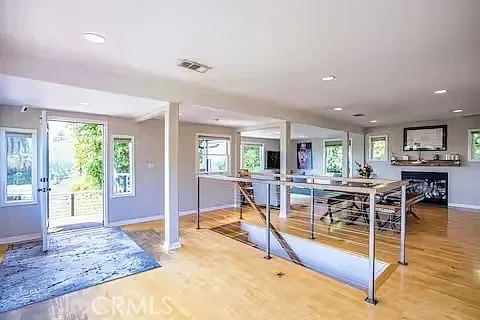 a view of a living room kitchen and dining room