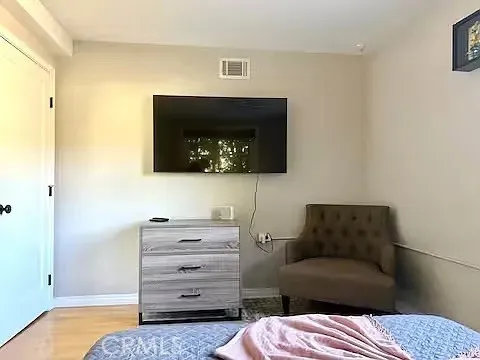 a living room with a couch and a flat screen tv