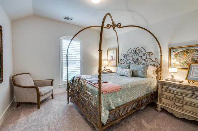 a bed room with a bed and window