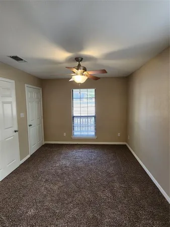 a bathroom with a double vanity sink and mirror