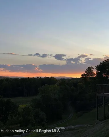 a view of a lake with a big yard