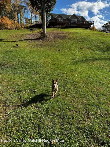 a view of a golf course with a lake