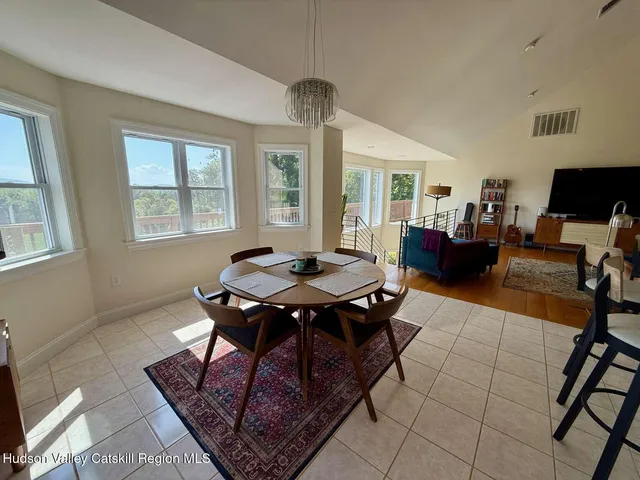 a view of a livingroom with furniture and window