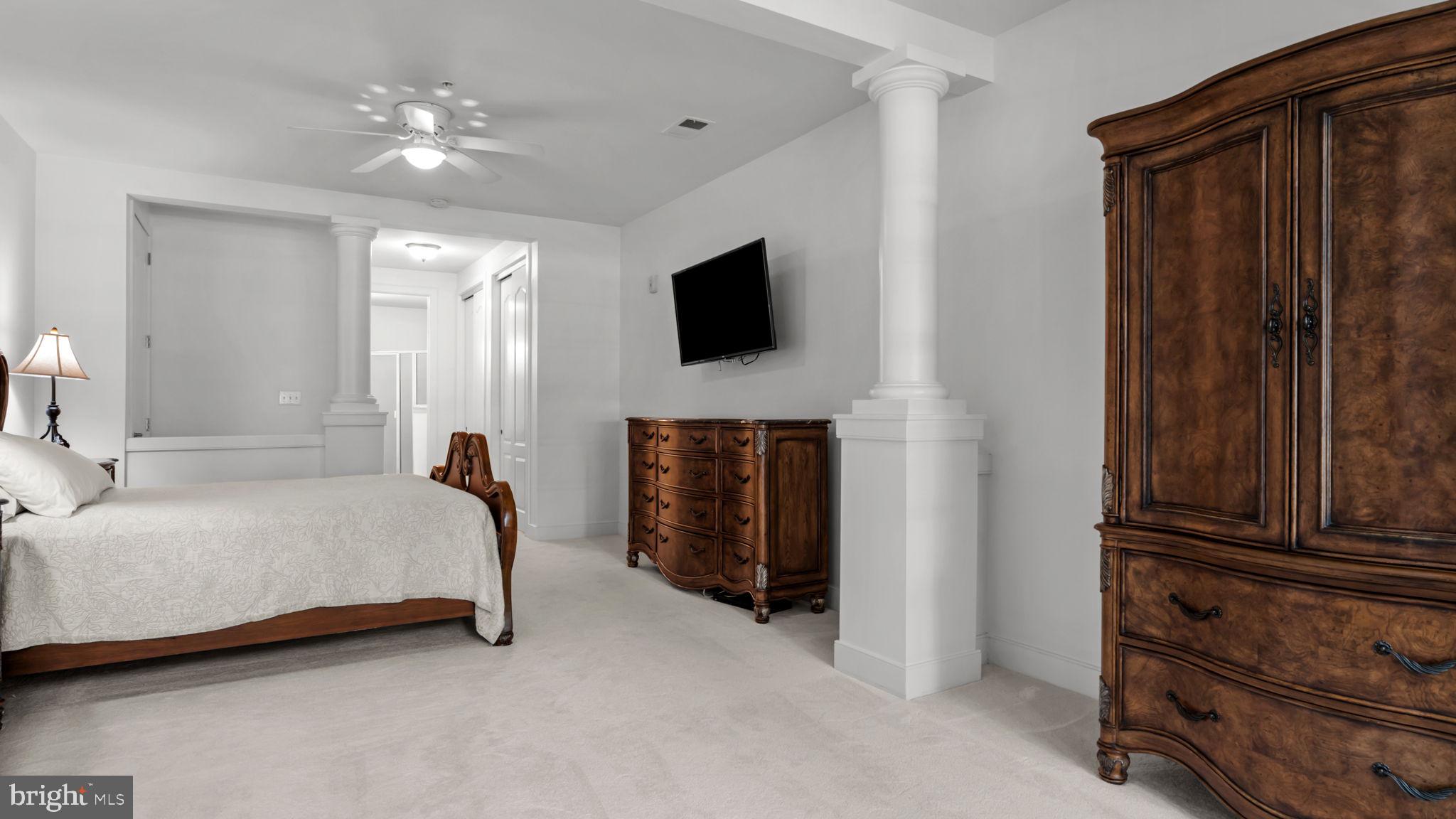 2102 Meridian Boulevard Warrington, PA 18976 - Photo 18 of 29 a spacious bedroom with a bed and a television