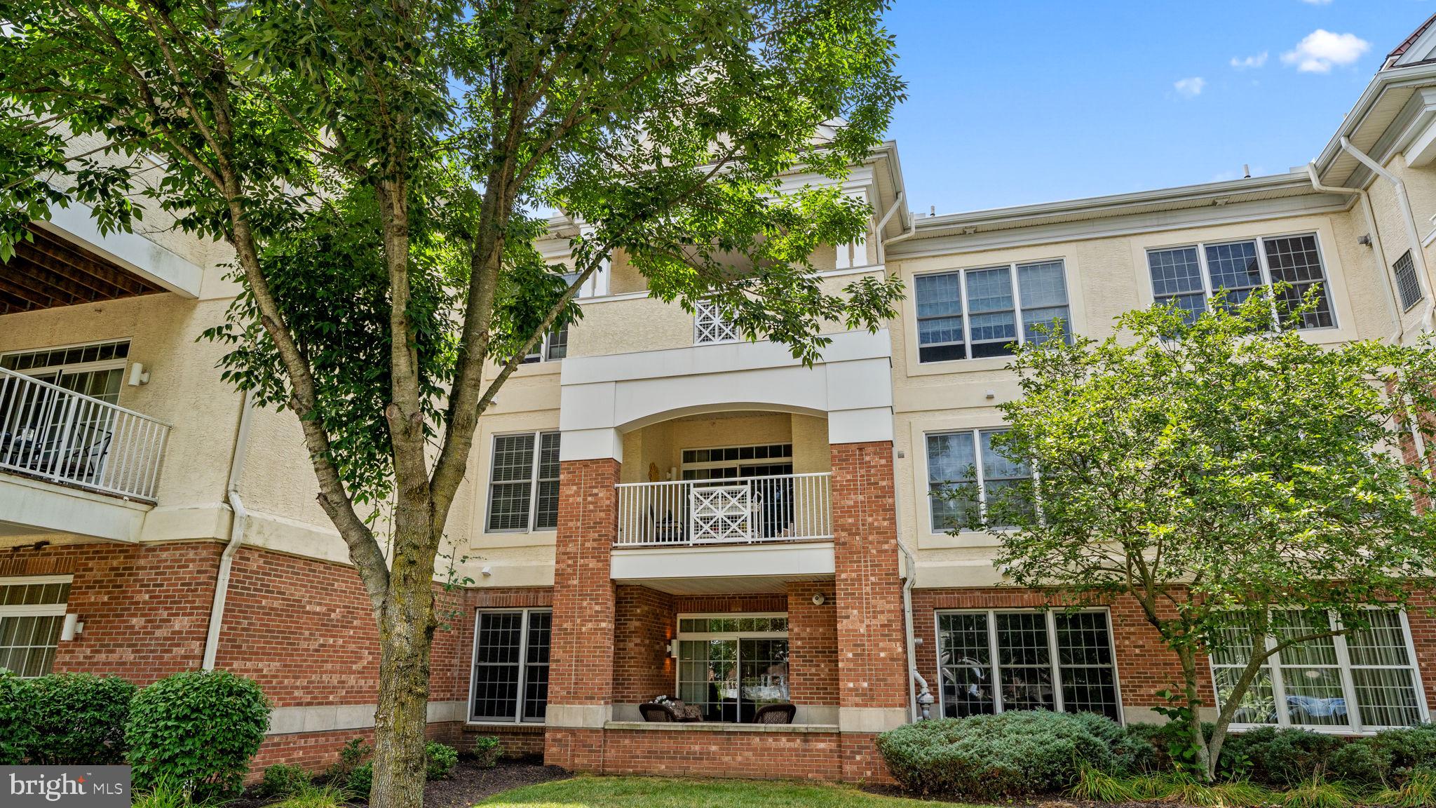2102 Meridian Boulevard Warrington, PA 18976 - Photo 2 of 29 a front view of a house with garden