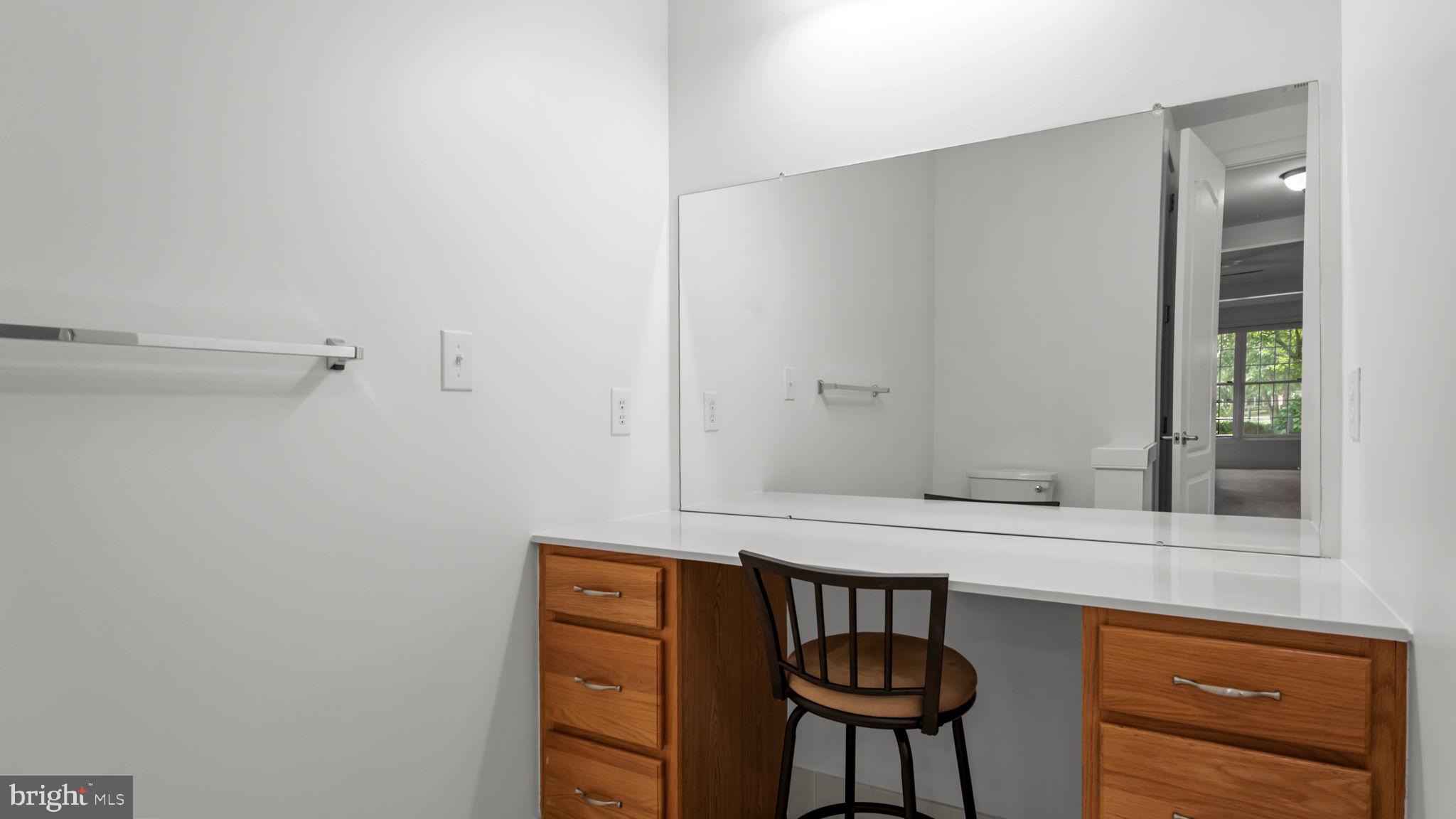 2102 Meridian Boulevard Warrington, PA 18976 - Photo 21 of 29 a bathroom with a sink a light fixture and a closet