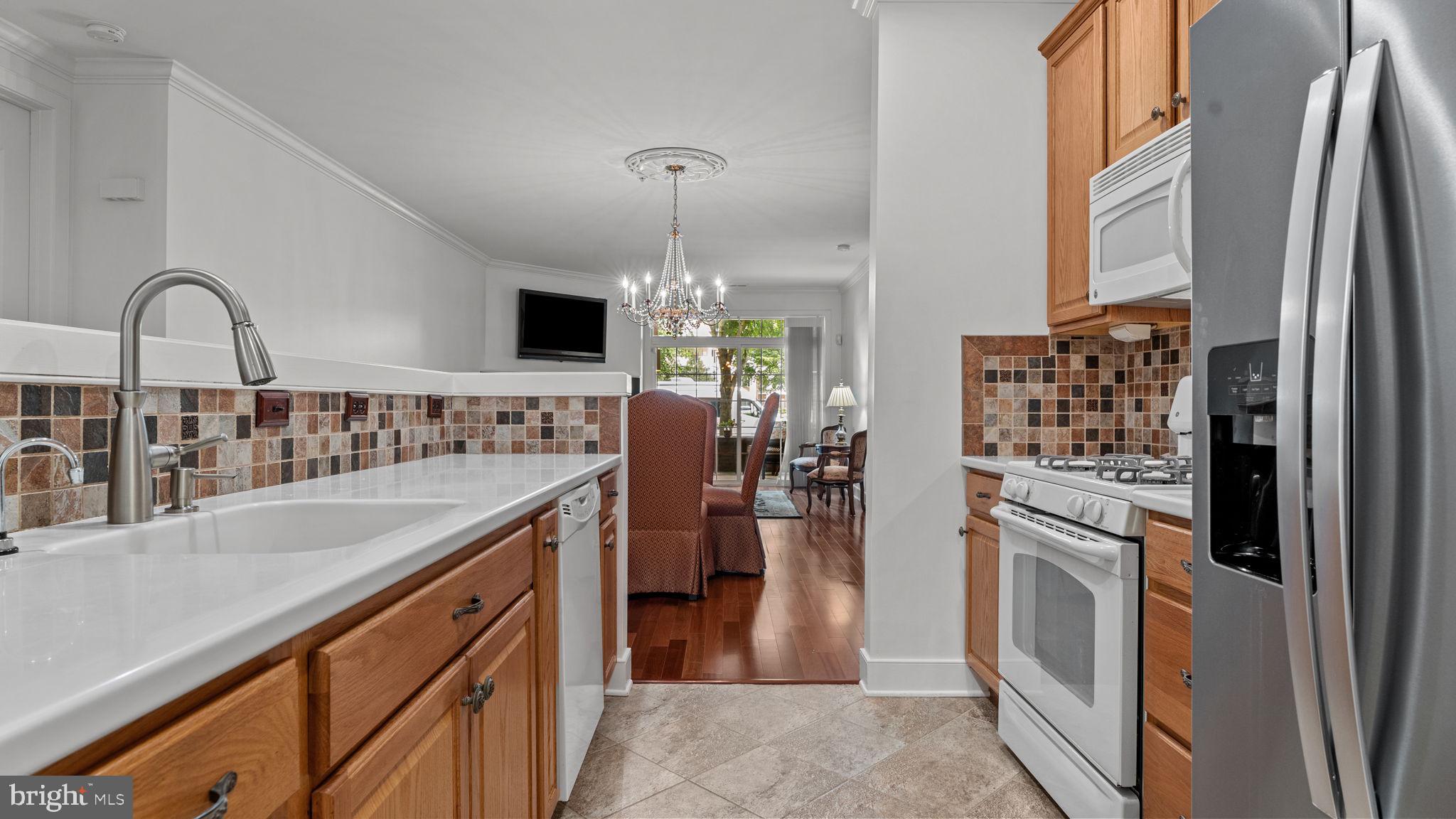 2102 Meridian Boulevard Warrington, PA 18976 - Photo 9 of 29 a view of a kitchen with a sink and refrigerator