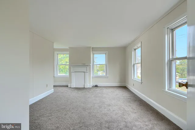 an empty room with windows