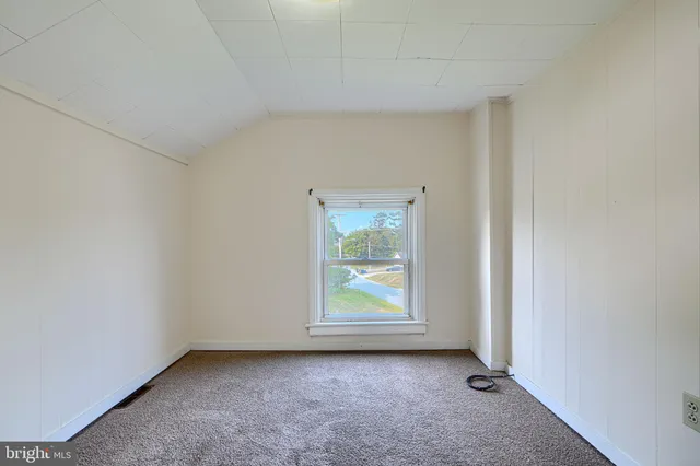 an empty room with window