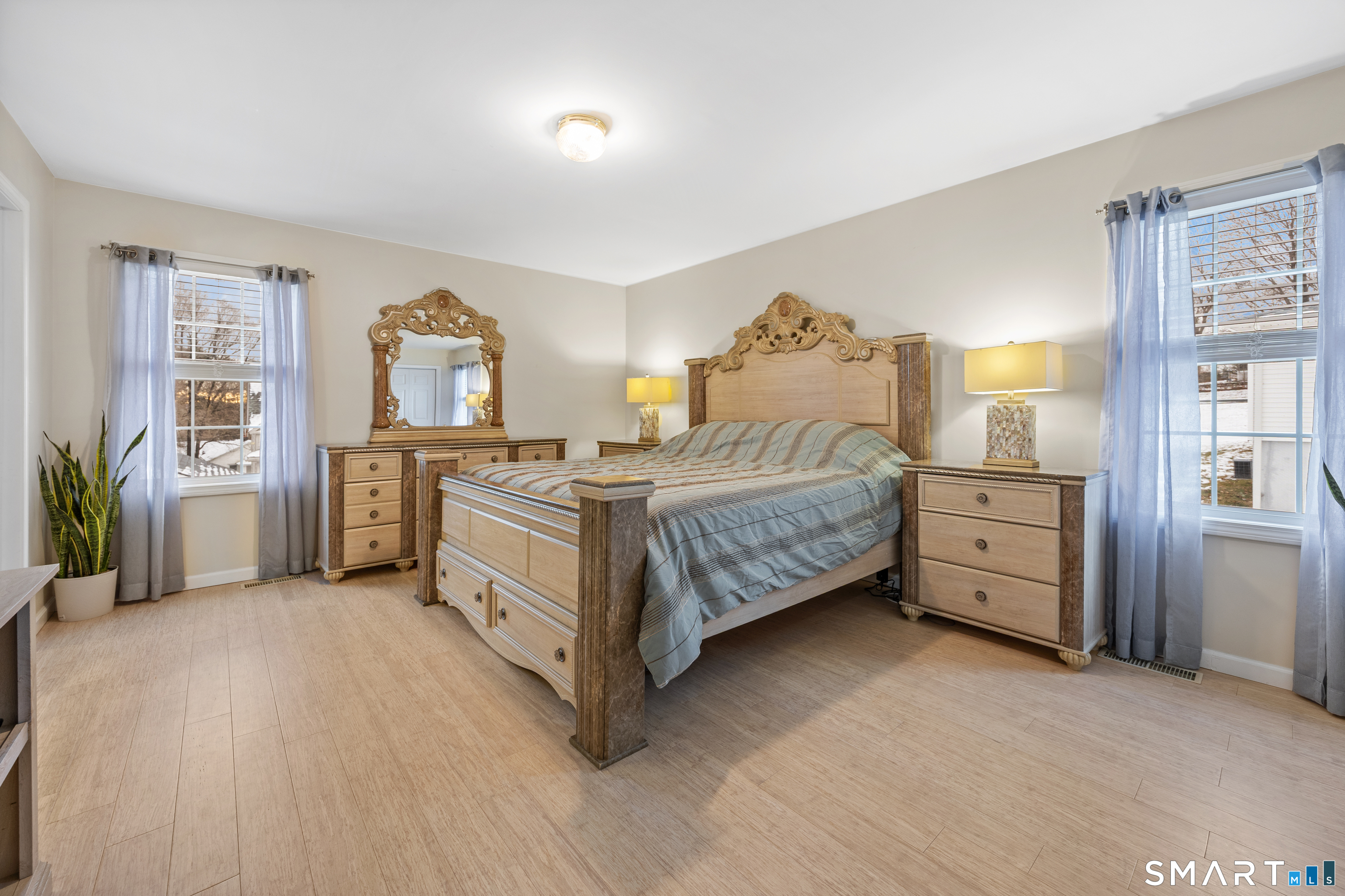 50 Paxton Street Watertown, CT 06779 - Photo 13 of 38 a bedroom with a bed and a cabinets