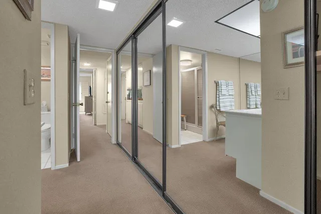 a view of hallway with shower