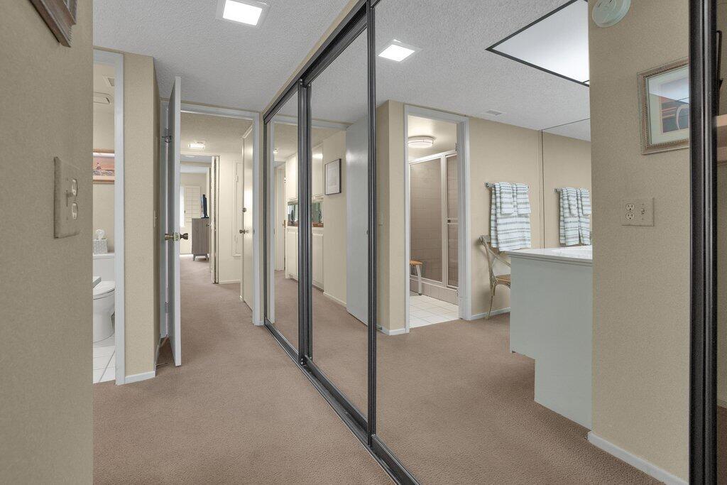 72302 Blueridge Court Palm Desert, CA 92260 - Photo 14 of 49 a view of hallway with shower