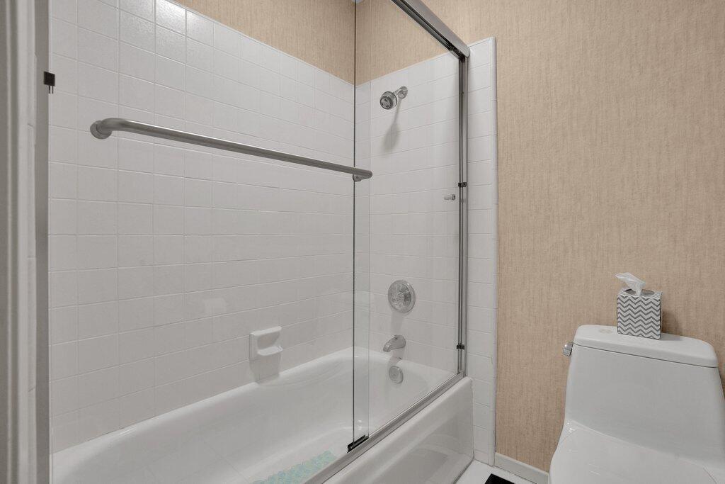 72302 Blueridge Court Palm Desert, CA 92260 - Photo 19 of 49 a bathroom with a bathtub and a shower