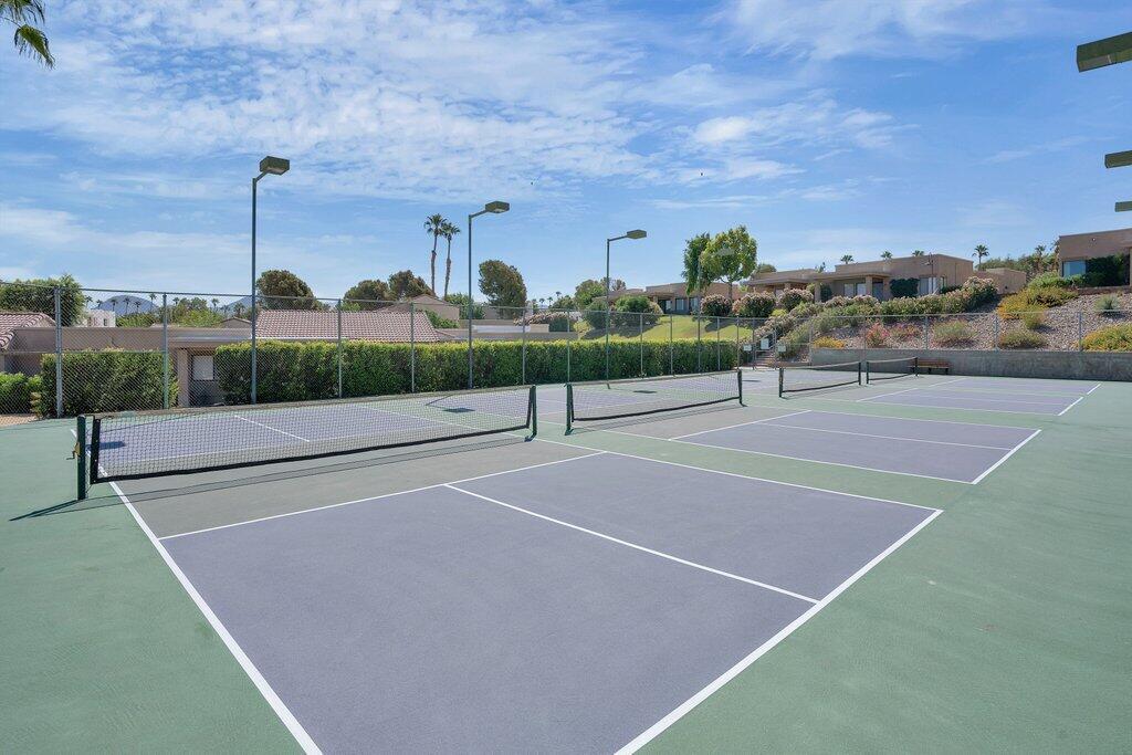 72302 Blueridge Court Palm Desert, CA 92260 - Photo 35 of 49 a view of a tennis court