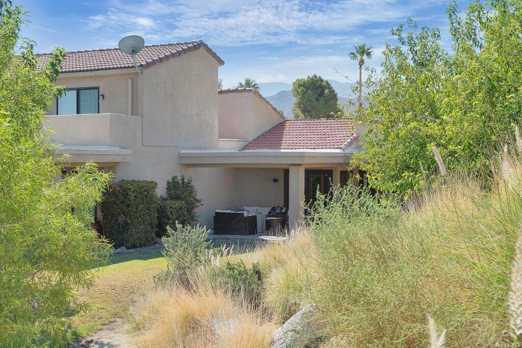 72302 Blueridge Court Palm Desert, CA 92260 - Photo 49 of 49 a view of a house with pool and garden