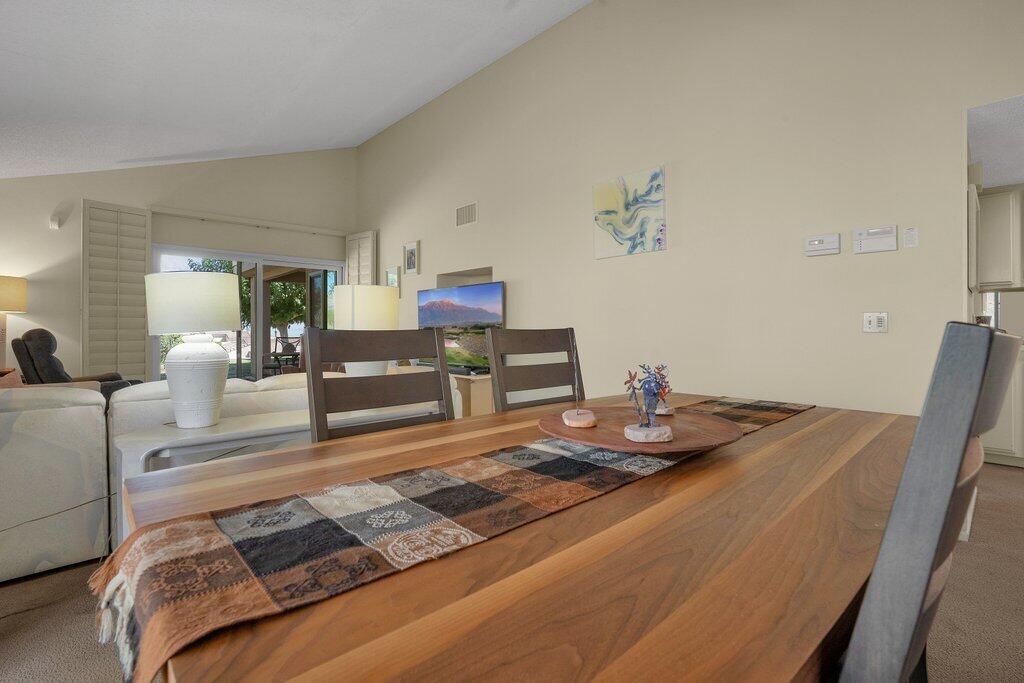 72302 Blueridge Court Palm Desert, CA 92260 - Photo 8 of 49 a living room with kitchen