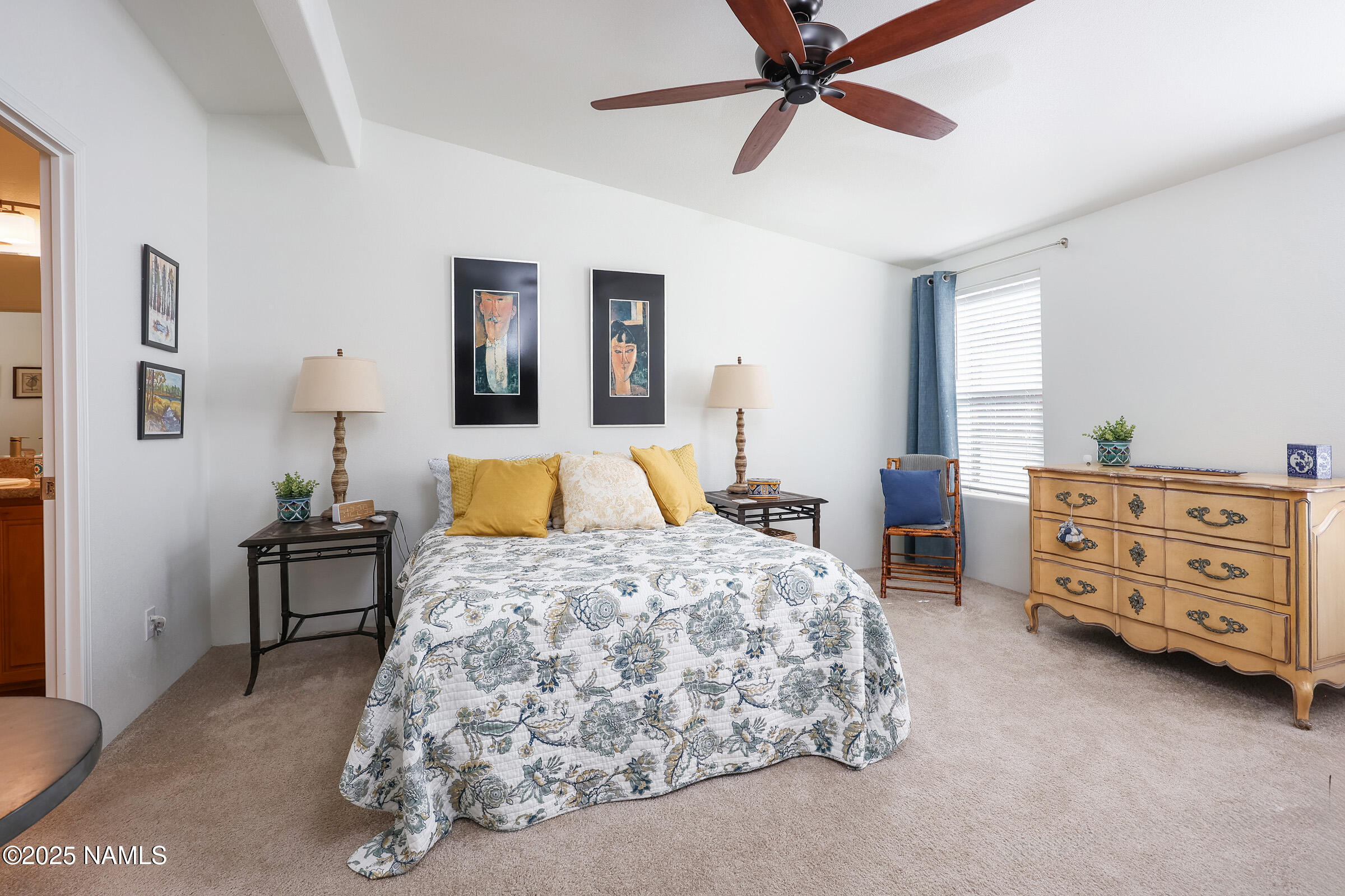 17265 Buffalo Run Munds Park, AZ 86017 - Photo 24 of 51 a bedroom with a bed and furniture