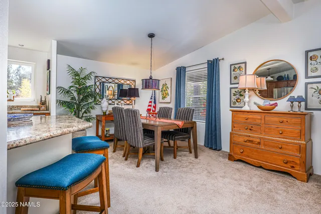 a view of a livingroom with furniture