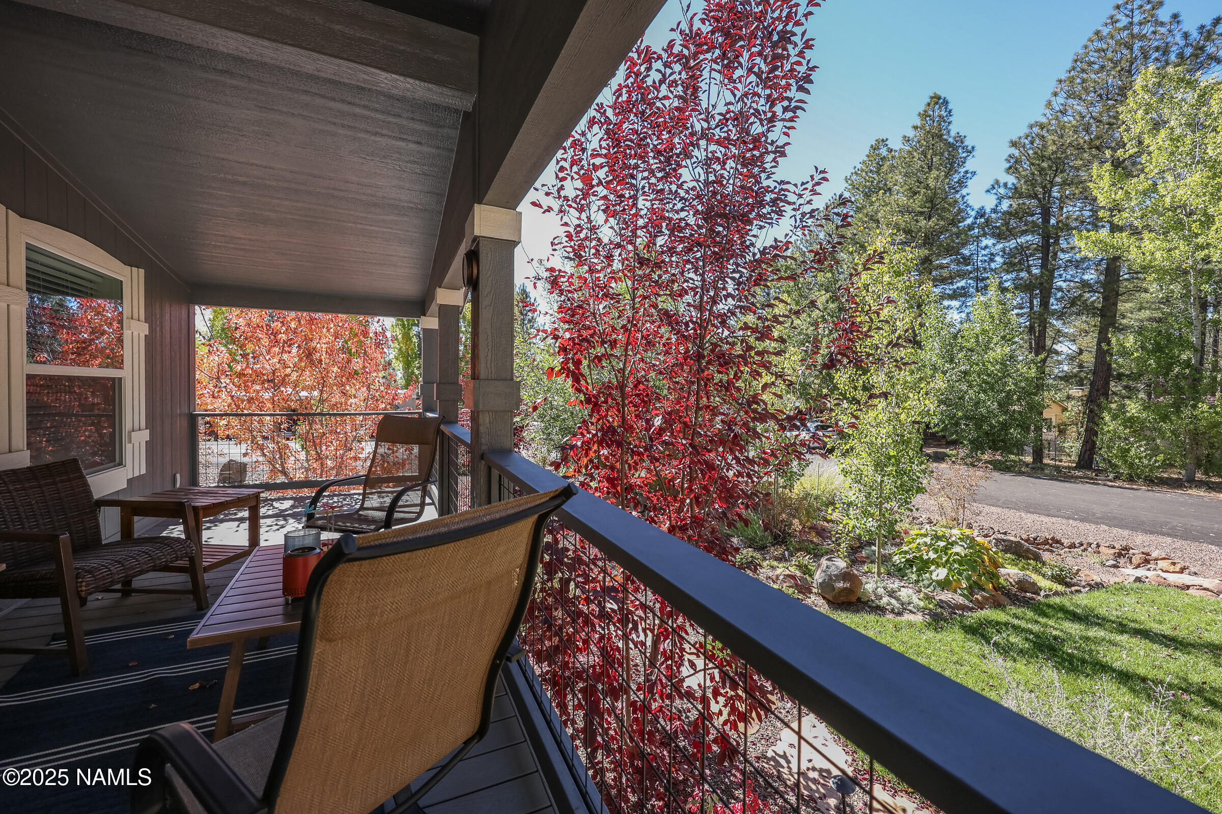 17265 Buffalo Run Munds Park, AZ 86017 - Photo 33 of 51 a view of a chairs and table in a balcony