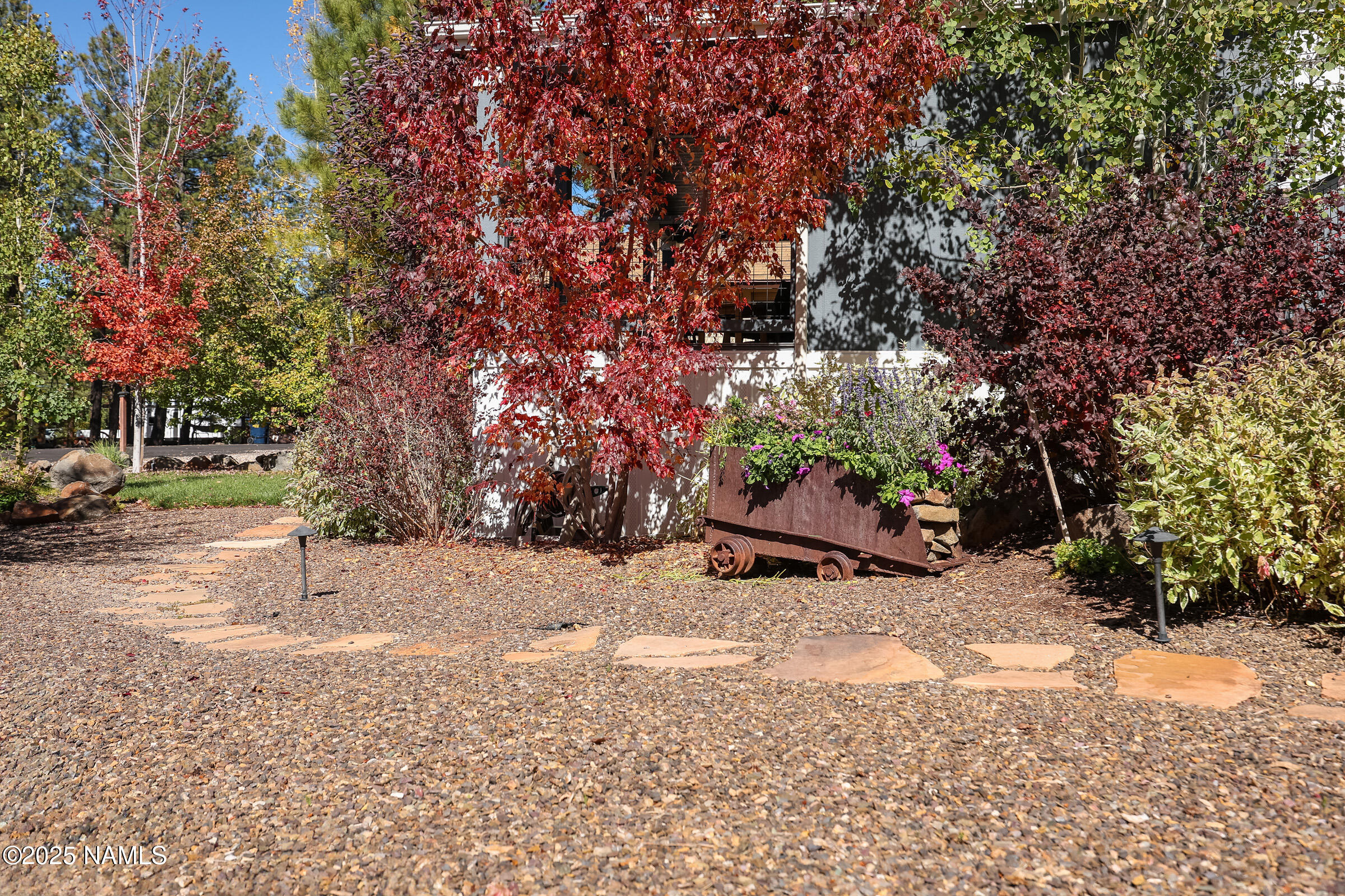 17265 Buffalo Run Munds Park, AZ 86017 - Photo 34 of 51 a street view covered with snow