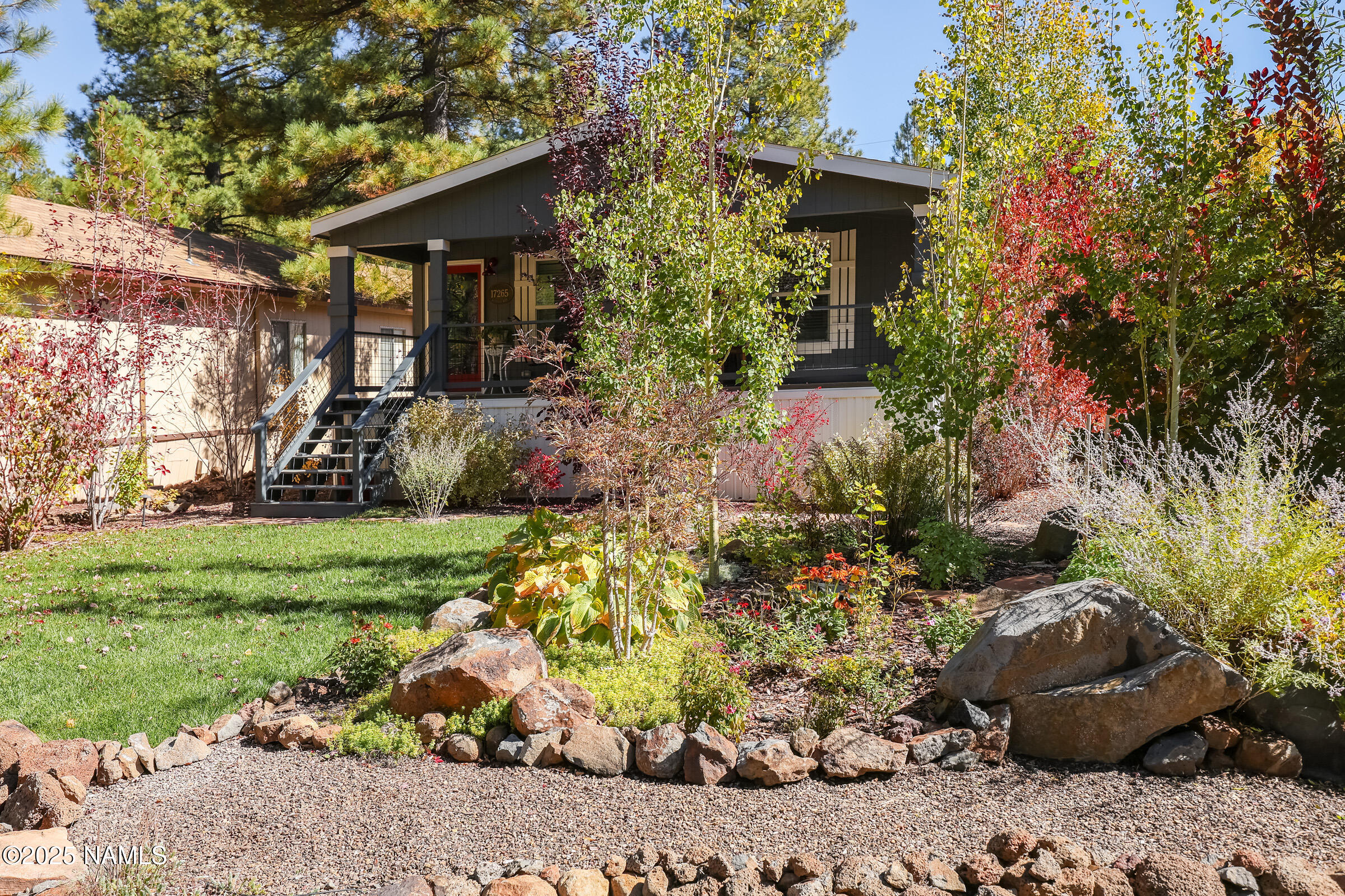 17265 Buffalo Run Munds Park, AZ 86017 - Photo 40 of 51 a front view of a house with a yard