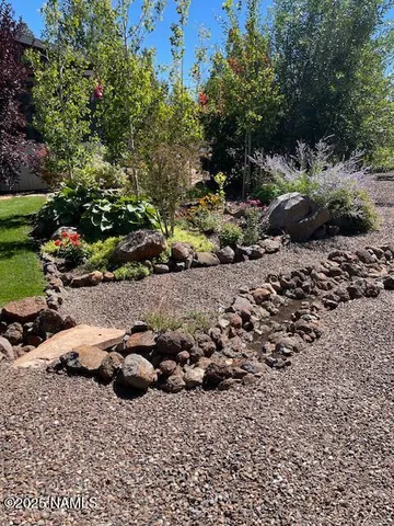 a group of cars parked in a yard