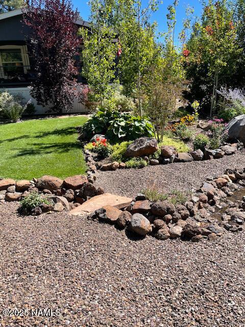 17265 Buffalo Run Munds Park, AZ 86017 - Photo 50 of 51 a group of cars parked in a yard