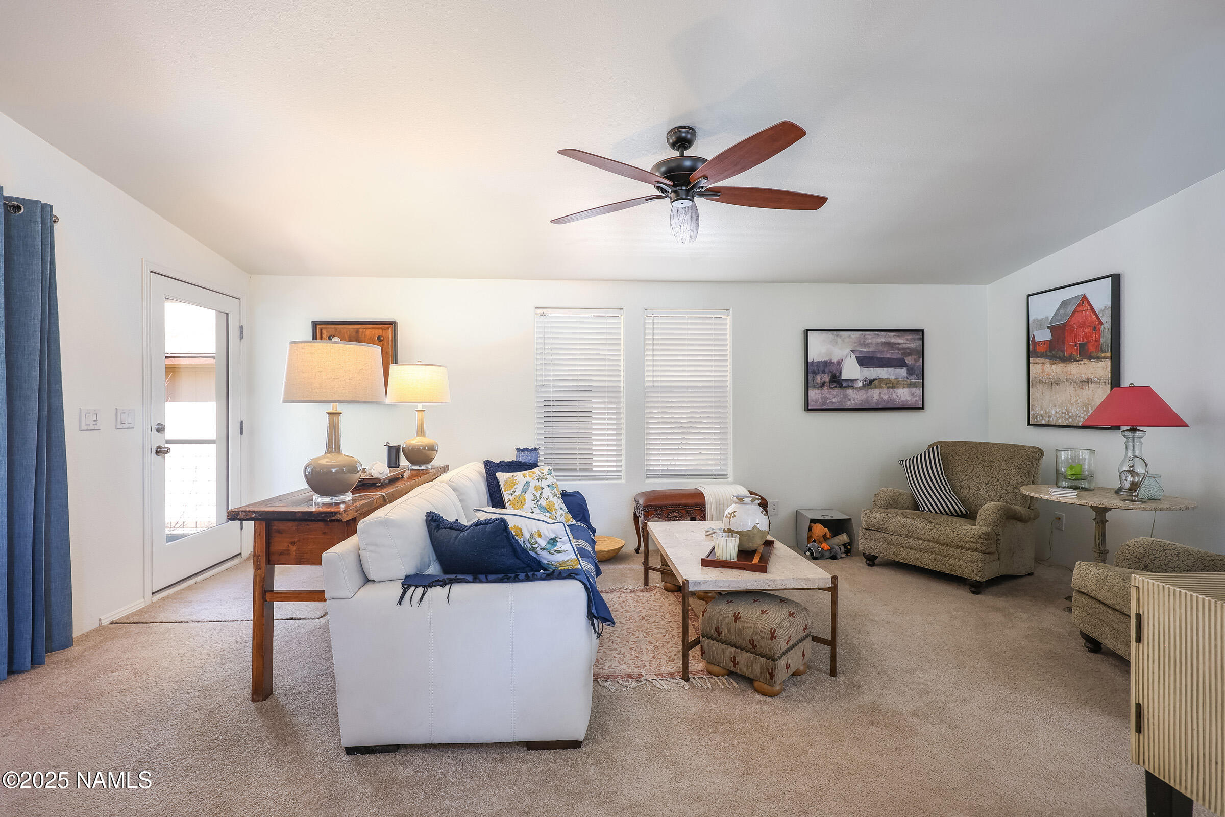 17265 Buffalo Run Munds Park, AZ 86017 - Photo 7 of 51 a living room with furniture and a large window