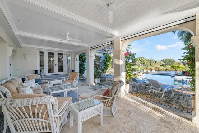 a living room with fireplace furniture and a flat screen tv