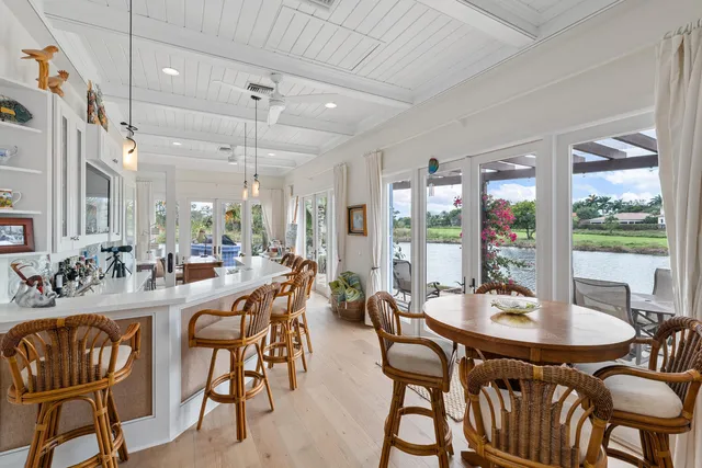 a living room with fireplace furniture and decor