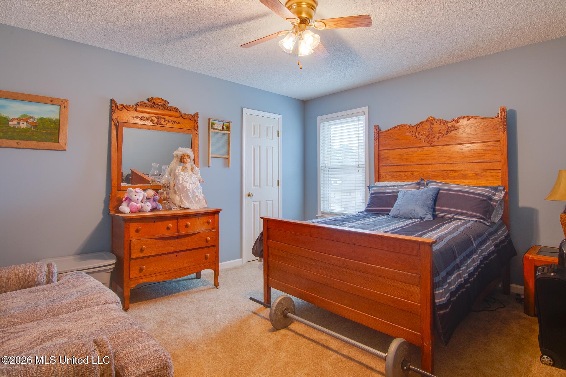 7160 Pecan Ridge North Southaven, MS 38671 - Photo 16 of 23 Upstairs Bedroom