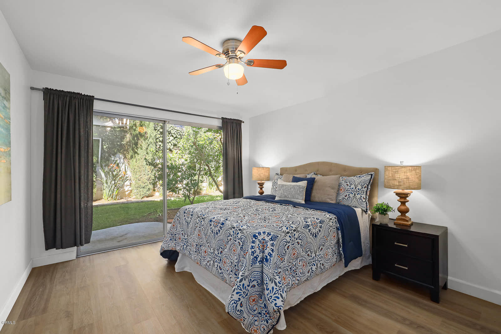 3815 Cartwright Street Pasadena, CA 91107 - Photo 13 of 25 a bedroom with a bed and a large window