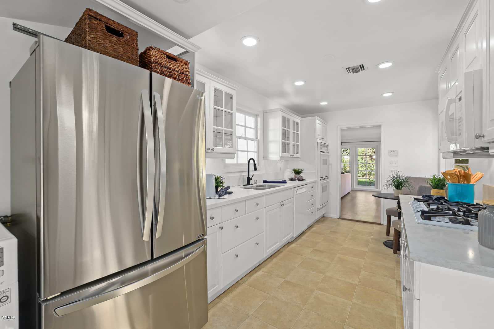 3815 Cartwright Street Pasadena, CA 91107 - Photo 17 of 25 a kitchen with stainless steel appliances a refrigerator and a stove top oven