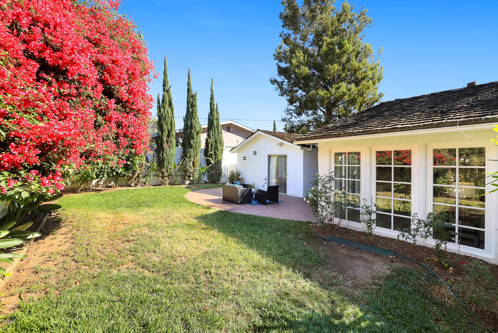 3815 Cartwright Street Pasadena, CA 91107 - Photo 24 of 25 a view of a house with backyard and sitting area