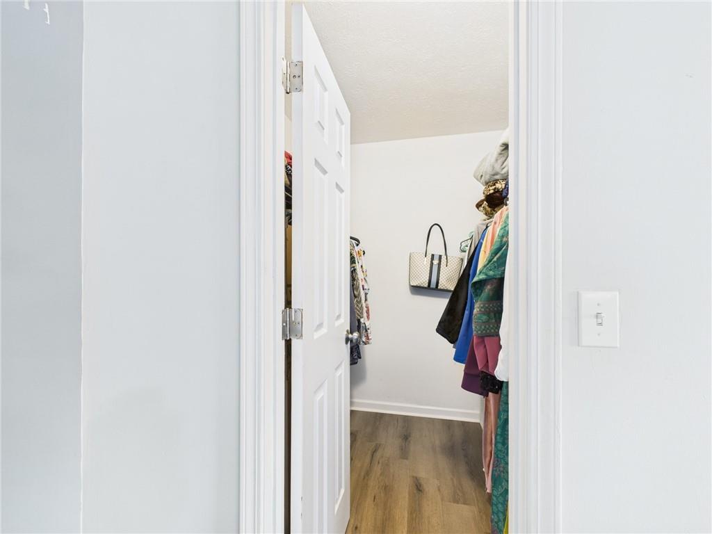 4060 Brooks Bridge Crossing Alpharetta, GA 30022 - Photo 26 of 30 a view of a hallway with of a white walls