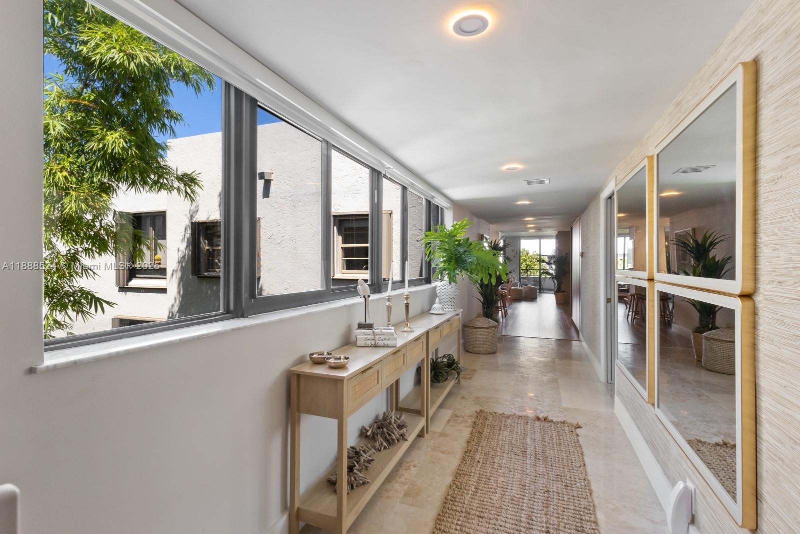 141 Crandon Boulevard, Unit 446 Key Biscayne, FL 33149 - Photo 2 of 30 view of a house with a porch