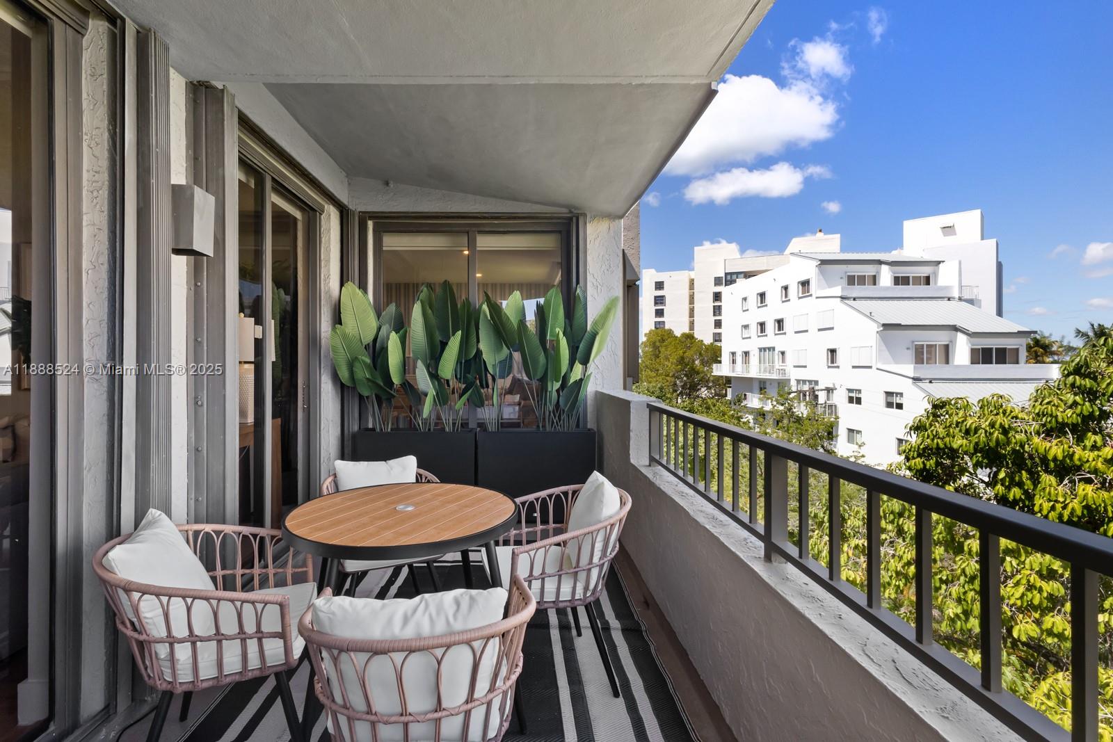 141 Crandon Boulevard, Unit 446 Key Biscayne, FL 33149 - Photo 21 of 30 a view of a balcony dining area