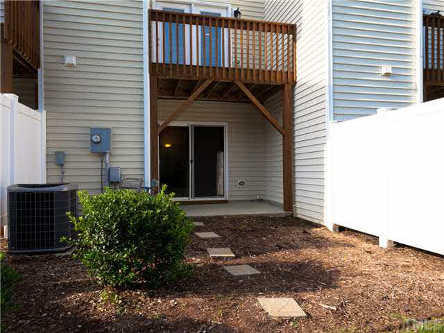 8840 Orchard Grove Way Raleigh, NC 27612 - Photo 14 of 24 This is a view of the lower level patio and yard area!