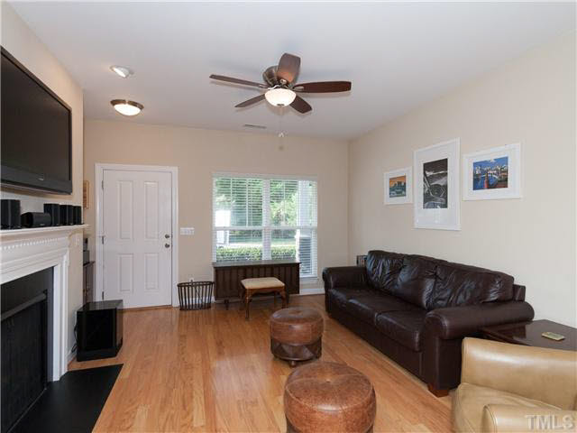 8840 Orchard Grove Way Raleigh, NC 27612 - Photo 4 of 24 Gas log fireplace in the living room!