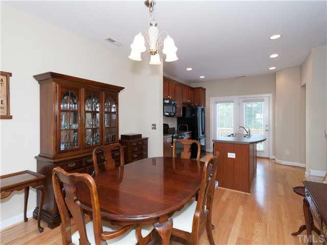 8840 Orchard Grove Way Raleigh, NC 27612 - Photo 5 of 24 Large open dining room that is open to the kitchen and living room!