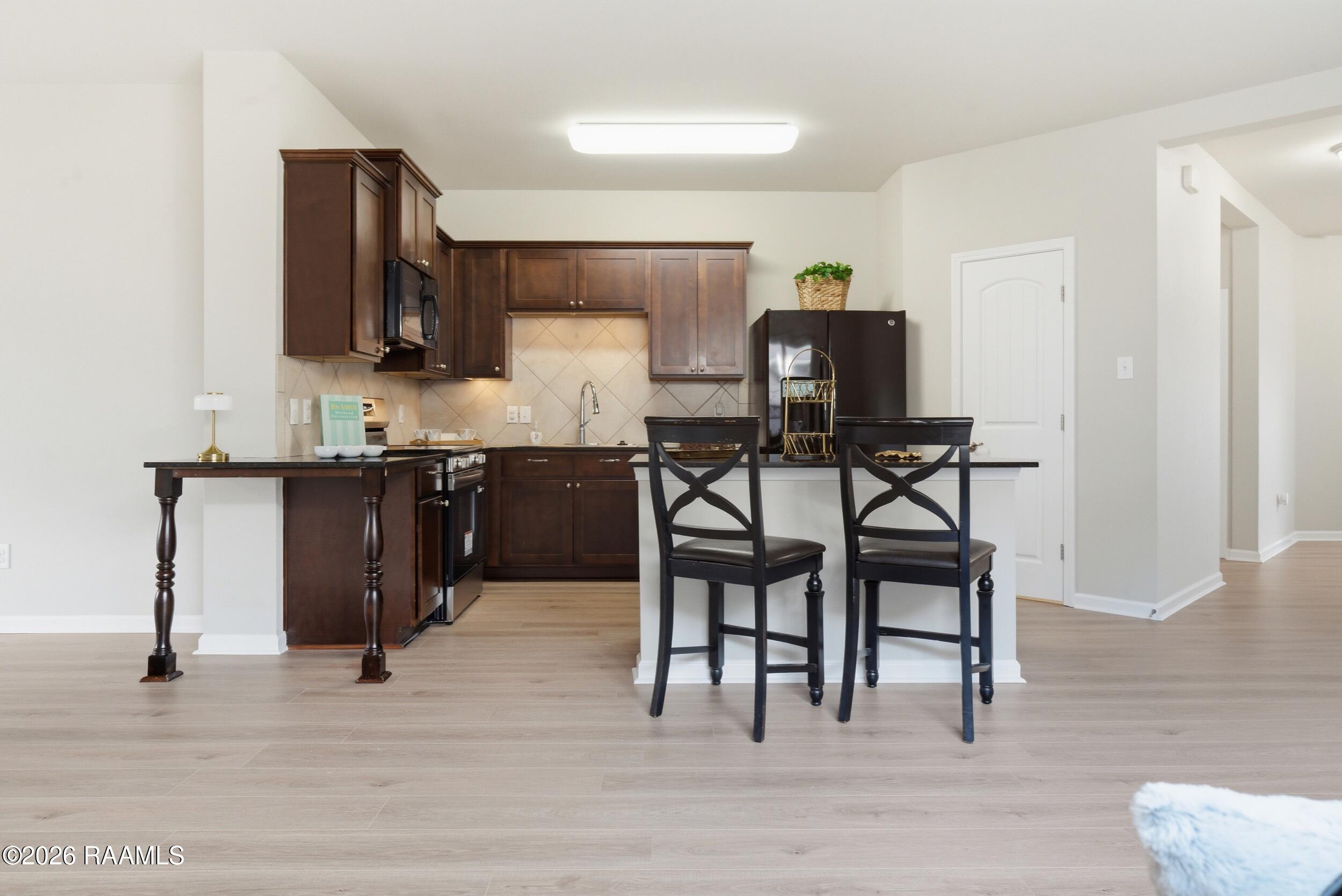 204 Bridle Way Lafayette, LA 70507 - Photo 3 of 9 HUGE living/Kitchen/dining area