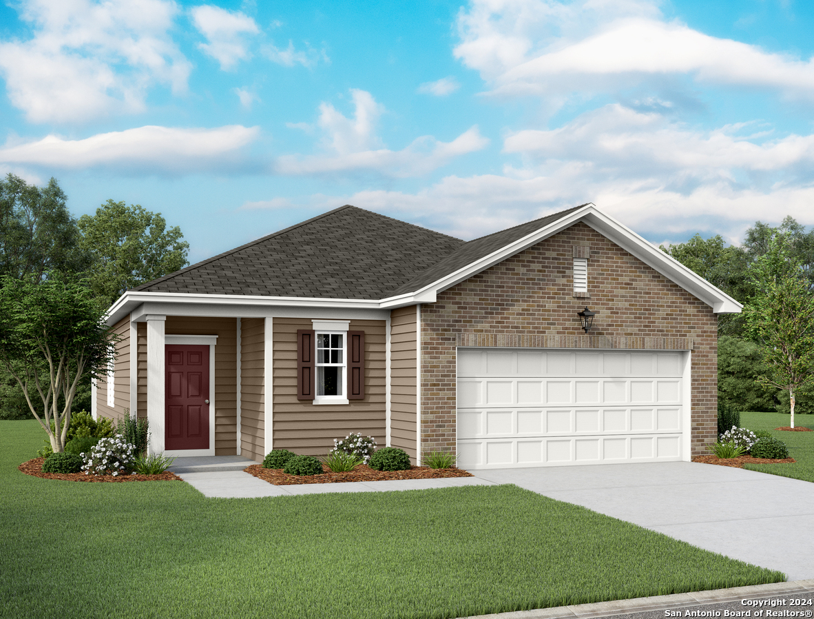 113 Dionicio Loop Seguin, TX 78155 - Photo 1 of 1 a front view of a house with a garden and yard