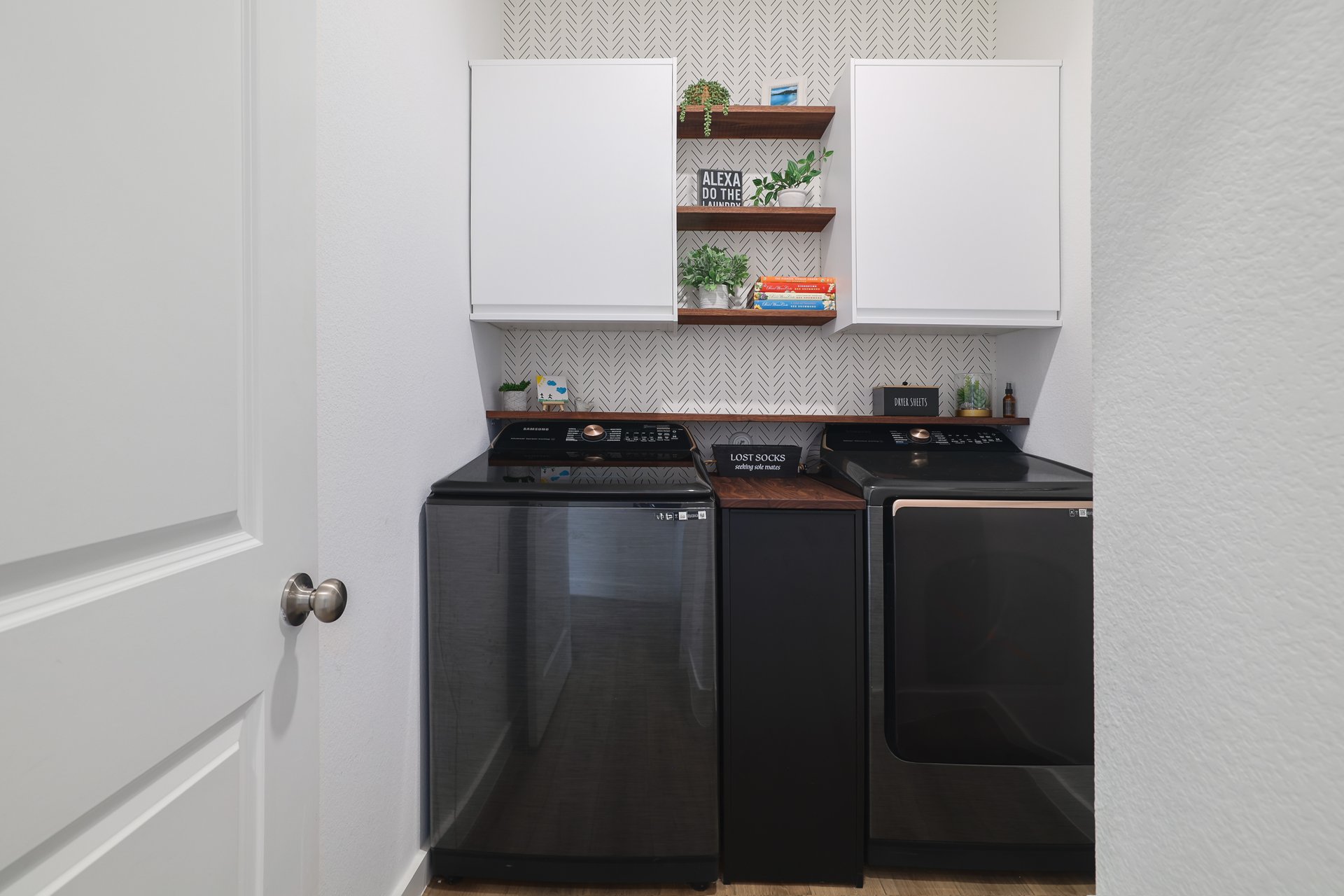 411 Jack Ryan Kyle, TX 78640 - Photo 11 of 30 a kitchen with a refrigerator and cabinets