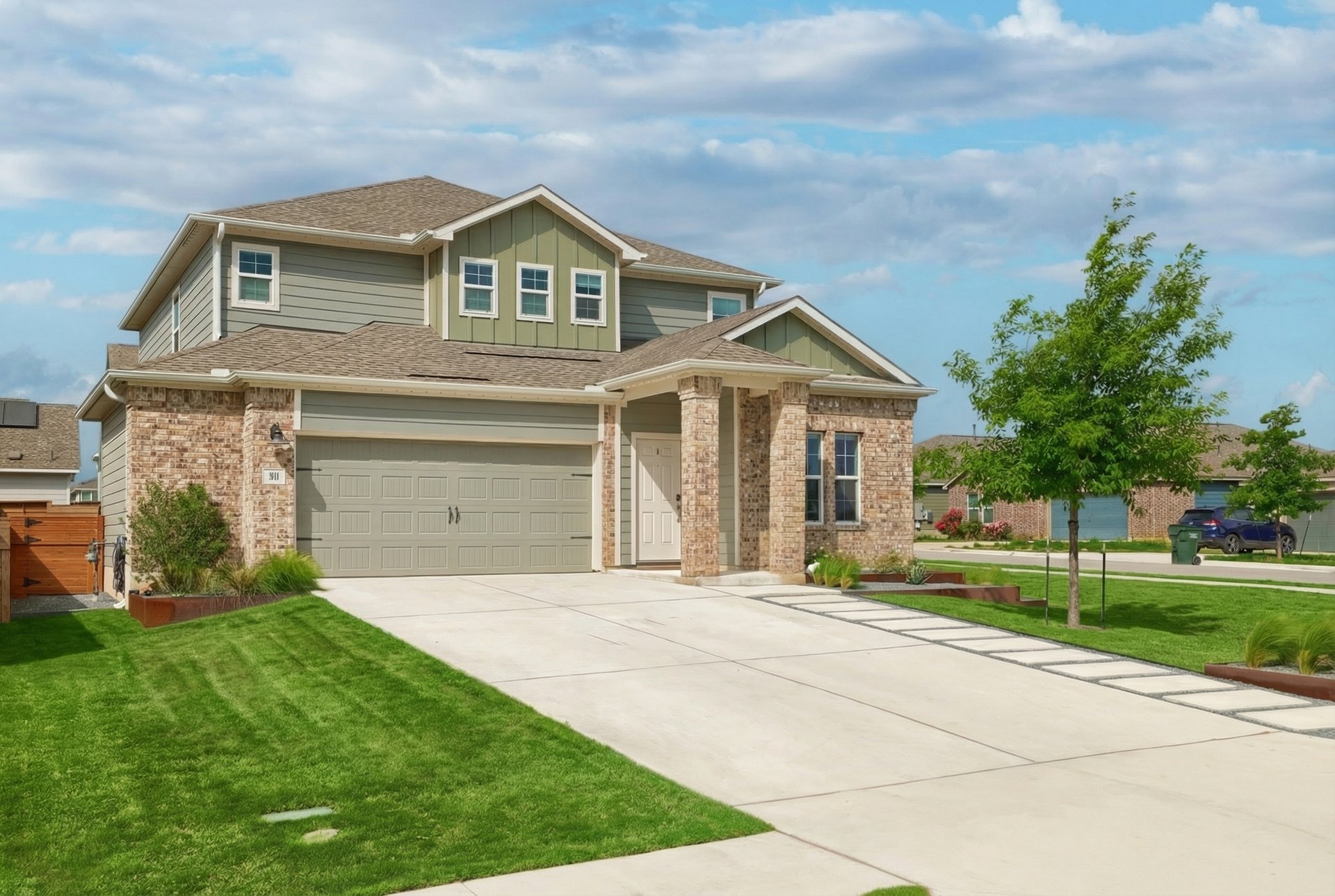 411 Jack Ryan Kyle, TX 78640 - Photo 2 of 30 front view of a house with a yard