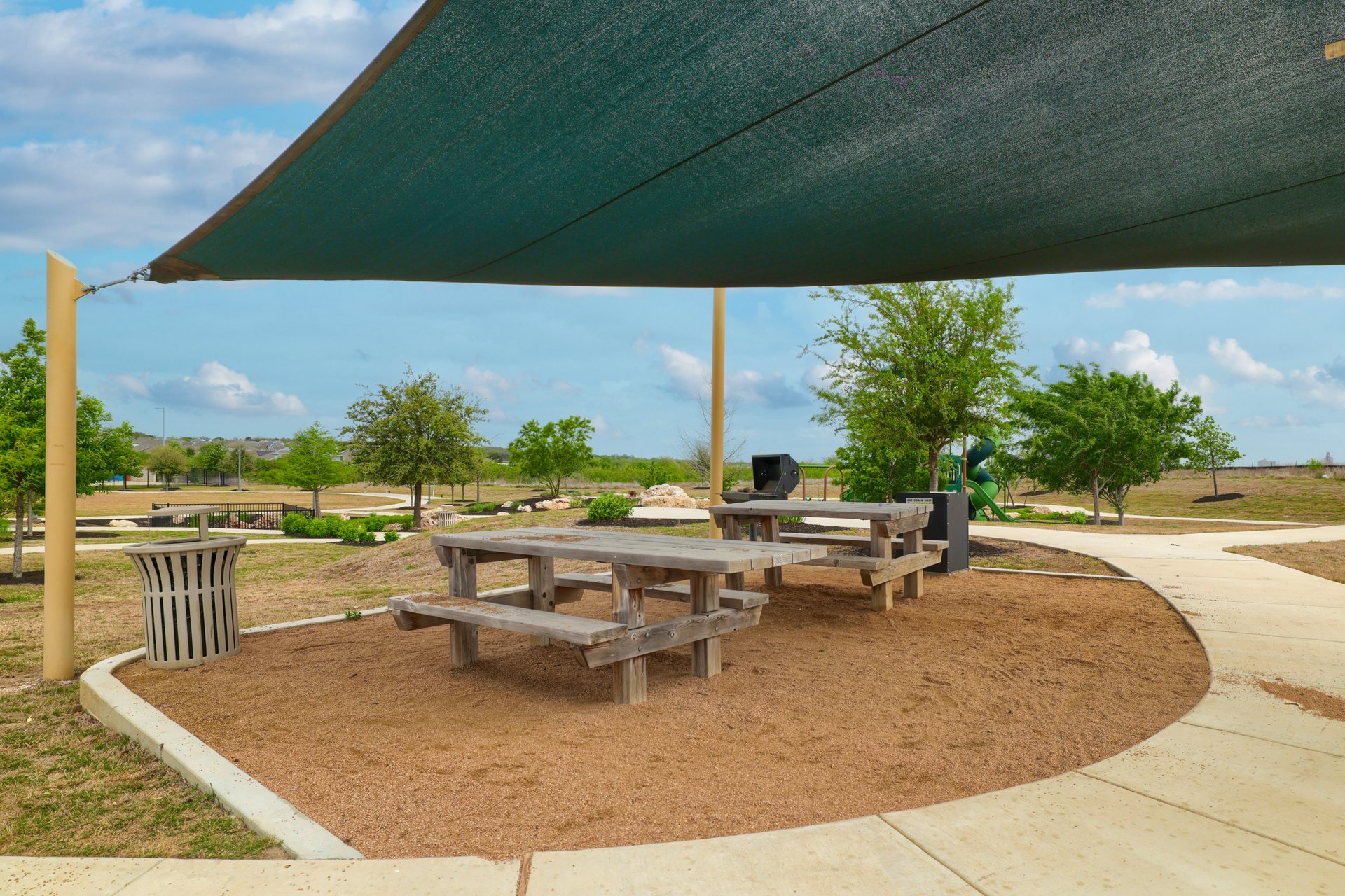 411 Jack Ryan Kyle, TX 78640 - Photo 26 of 30 a backyard of a house with outdoor seating